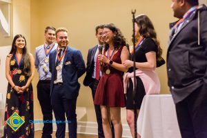 Students on stage at Associated Students banquet