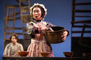 Female student performing in Oliver Twist play