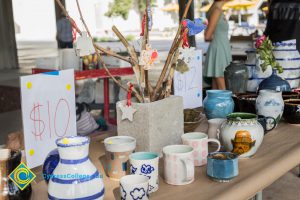 Ceramic items on display table.