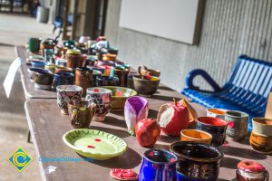 Ceramic items on display table.