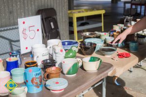 Ceramic items on display table.