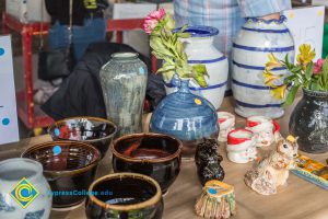 Ceramic items on display table.