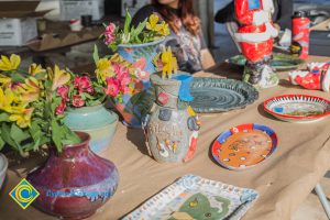 Ceramic items on display table.