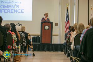 Joanna Schilling speaking at the West Orange County Women's Conference.