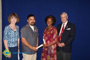 Two students with staff at the 2015 Scholarship Awards.