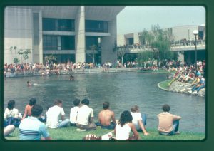 Students gathered around the pond waiting for the Duck Pond Races to begin.