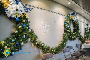 Garland and wreath decorations on the wall.