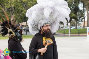 Employees dressed up for Mardi Gras parade