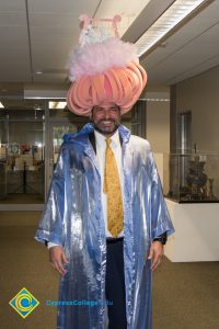 Campus Communications Director Marc Posner dressed up for Mardi Gras parade