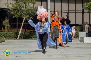 Employees dressed up for Mardi Gras parade