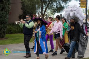 Employees dressed up for Mardi Gras parade