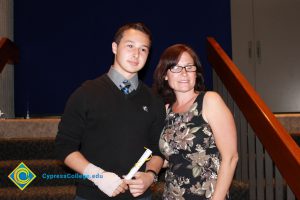 Scholarship recipient with his mom.