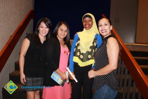 Lili Perez with scholarship recipients.