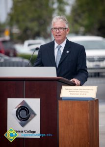 Bob Simpson standing at podium.