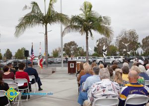 Seated guest of 2016 Veteran's Day Anniversary.