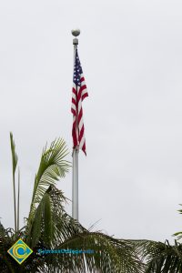The American flag on flagpole.