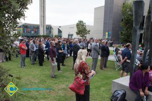 A crowd of people on campus.