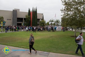 Crowd on campus lawn.