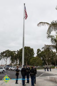 Lowering flag at 2016 Veteran's Day Anniversary.