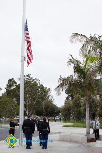 Lowering the flag.