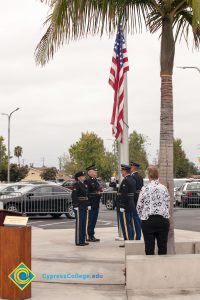 Lowering the flag.