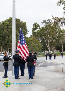 Lowering the flag.