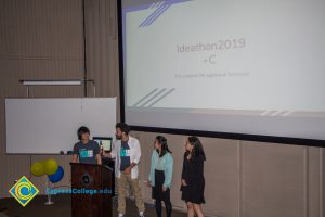 Group of four students giving presentation at the Ideathon event.