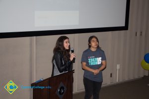 Two students giving presentation at the Ideathon event.