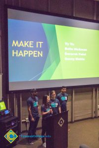 Group of four students giving presentation at the Ideathon event.