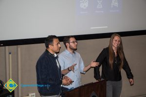 Group of students giving presentation at the Ideathon event.