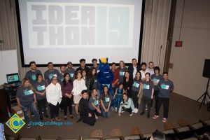 Students standing with Charlie the Charger.