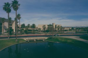 View of the pond with the campus in the background.