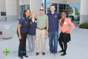 President Bob Simpson with a group of staff and students.