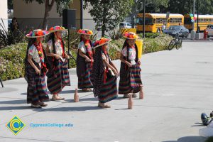 Young women performing a dance for the 2014 KinderCaminata.