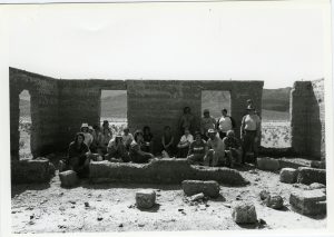 Cypress College students sitting around ruins during a geology field trip.