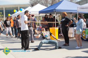 Students doing the limbo at Club Rush.