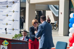 Dr. Schilling shaking hands with Rick Rams.