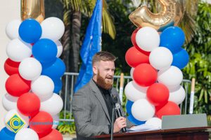 Man with a beard speaking at Veteran's Resource Center Groundbreaking.