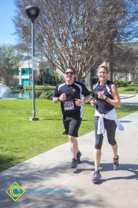 Participants running in the 3rd Annual Veteran's 5k on campus.