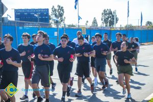 A group of young men and women running in the 3rd Annual Veteran's 5k.