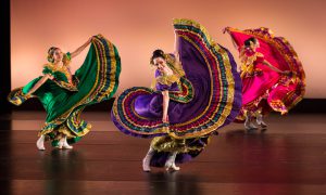 Folklórico dancers with their beautiful colorful dresses.