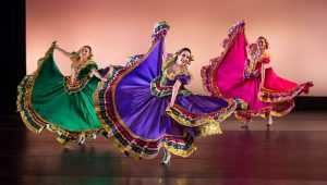 Folklórico dancers with their beautiful colorful dresses.