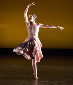 Female ballet dancer performing for People in Motion dance concert.