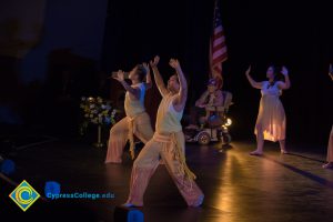 Dancers performing on stage at the 2018 Yom HaShoah event.