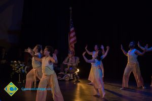 Dancers performing on stage at the 2018 Yom HaShoah event.