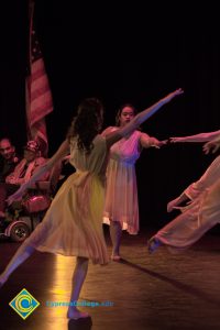 Dancers performing on stage at the 2018 Yom HaShoah event.