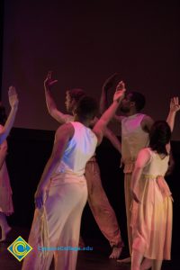 Dancers performing on stage at the 2018 Yom HaShoah event.
