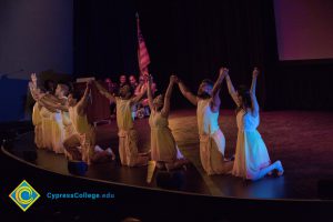 Dancers performing on stage at the 2018 Yom HaShoah event.