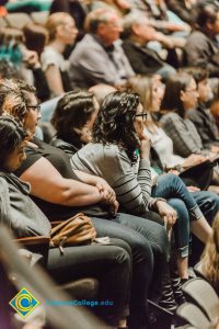 Audience listening at the Yom HaShoah event.