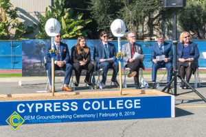 Staff sitting during SEM Groundbreaking ceremony.